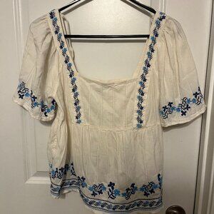 Embroidered blue and white blouse